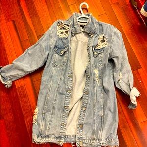 Light blue distressed denim jacket